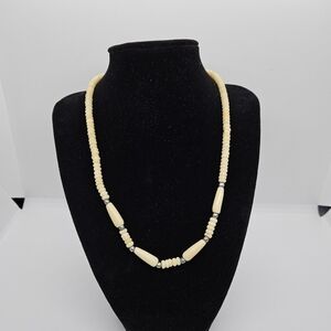 bone bead necklace with silver tone separators